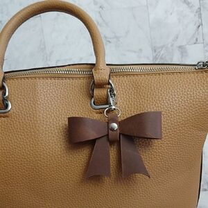 Elegant Leather Brown Bow Purse Charm With Silver Hook